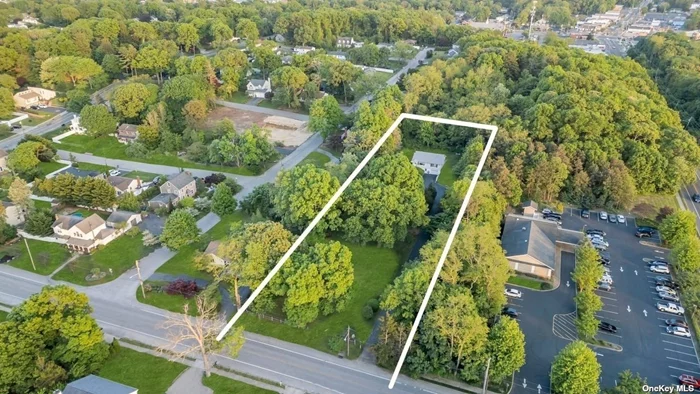 Once in a lifetime opportunity in your own private oasis. One of the largest undeveloped lots in Lake Ronkonkoma. Calling all land lovers, developers, builders, and nature enthusiasts! Secluded 1.31 Acres backing Brookhaven land. Possible subdivsion, one to two building lots Long private blacktop driveway with large parking area leading to two-bedroom, two bath ranch house at the top of the lot. House features vinyl siding and front portico. Open floor plan, lots of natural light, large living room with ceiling fan, chef&rsquo;s kitchen with maple cabinets, granite countertops, stainless steel fridge, tile flooring, lots of cabinet and counterspace. Hallway bath with tub and shower, two spacious bedrooms, rear yard with paver patio, great for entertaining. Full finished basement at grade with private entrance, possible second kitchen, one and a half car garage leading into home. Low taxes, taxes without exemptions $8, 921.10. Sachem School District. Public and Well water