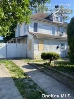 Great opportunity to Restore this Hidden Gem. House Needs Interior & Exterior work. Currently set up as 2 Bedrooms 1 Full bath , Formal Living & Diningroom , Enclosed Porch & Full Basement . Walk up Attic has a Skylight .Good size Yard with Detached Garage. Located on a Dead End Block