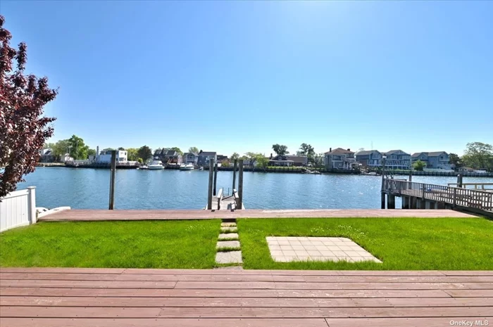Beautiful Waterfront Home On Randalls bay in south Freeport, perfect for boating, jet skiing paddle boarding or just watching the boats go by on a sunny afternoon. This home consists of two Bedrooms, Two Full Bath, Large Living Room, Eat In Kitchen w/Beautiful Views, Two Fireplaces, Two Decks One upstairs and One Downstairs, Huge Lower Level w/Lots of space, converted two car garage with endless possibility&rsquo;s. Quiet street two car driveway, A true vacation from home.