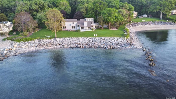 Desirable Lloyd Neck Estates Prime WATERFRONT on the Long Island Sound. Offering amazing lifestyle with many social activities as well as Lloyd Harbor Beach with mooring, lifeguard, camp, tennis and Pickleball. Situated on 2.25 acres of lush property with plenty of room for a pool. Walls of windows and multiple balconies offers water views from every room. Large Living room with fireplace and cathedral ceiling. Inviting cook&rsquo;s kitchen with spacious eat-in. Flexible floorplan for all lifestyles. Fee the sea breeze and enjoy the best sunsets.