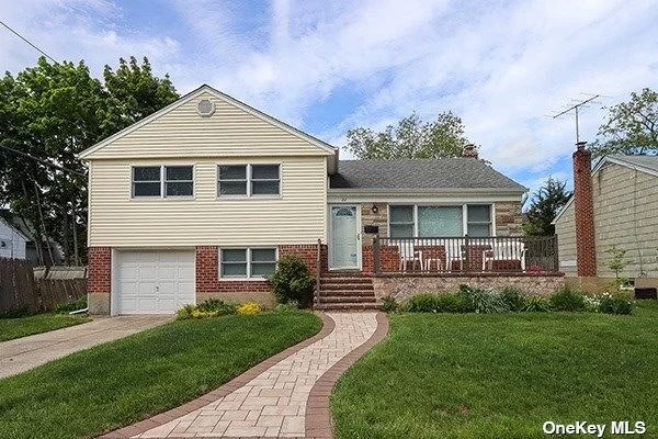 Move in Ready! Meticulously Maintained Split Level Home Located in Syosset School District. Inviting Main Level Which Includes LR, DR and EIK. Upstairs to primary BR W/full bath, 2 additional spacious bedrooms, full bath. Lower Level Features Cozy Den, Half Bath, Laundry Room and Outside Entrance. Extremely Clean 1/2 Basement With Tons of Storage. 1 Car Attached Garage. Ideal for Anyone Looking to Create Their Perfect Home in a Desirable Location. This Beautiful Home Will Not Last. Schedule a Showing Today!