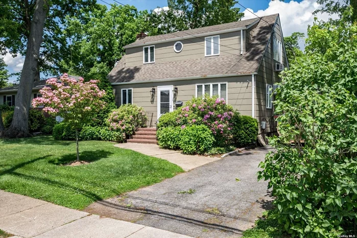 Welcome to this fabulous dormered cape located in the desired twin Lakes section of Wantagh. This lovely home is close to shopping, schools, transportation, and is situated mid-block on a beautiful tree lined street. The property is well maintained with a stunning parklike yard, perfect for enjoying and entertaining (55 x150). The home features, Anderson windows, an inground sprinkler system, hardwood floors throughout, eat in kitchen with stainless steel appliances, LOW taxes, gas cooking, gas dryer, gas grill, separate hot water heater, cedar lined closets, plenty of storage space,  a separate heating zone on each floor, a huge detached two car garage with an attic for storage, a full partially finished basement with an outside entrance, possible mother daughter with proper permits. The home also has four spacious bedrooms, two full baths, living room, and partially finished basement Home is being sold AS IS. All information deemed accurate, but should be verified by buyers.