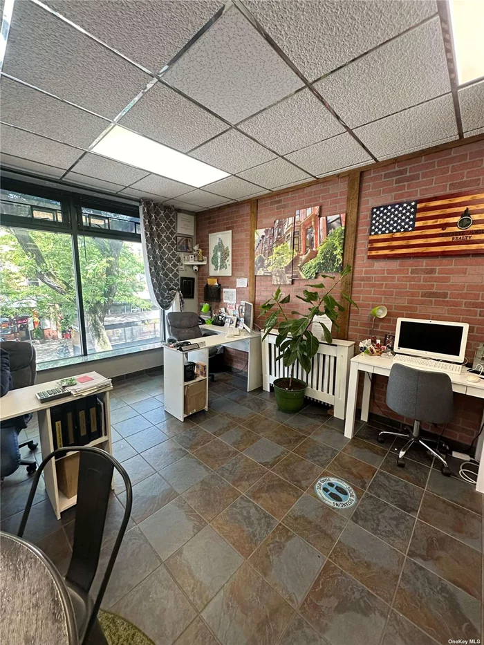 Beautiful Commercial space on fresh pond rd. This second floor commercial space offers an excellent location on the corner of Fresh Pond and Myrtle Ave. Tenant only pays electric.