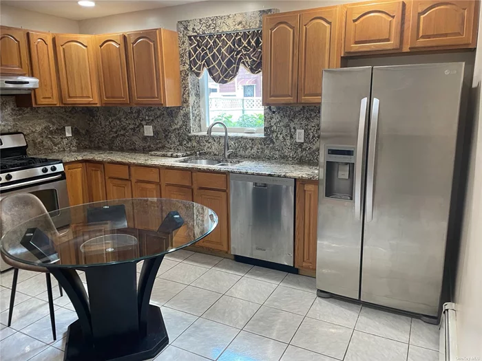 Beautifully Maintained Light And Bright Main Level Updated One Bedroom Eat In Kitchen With Granite Counter Tops Stainless Appliances And Gas Cooking Full Bath With Double Shower Large Living Room With Double Closets Us Of Backyard And Ample Street Parking