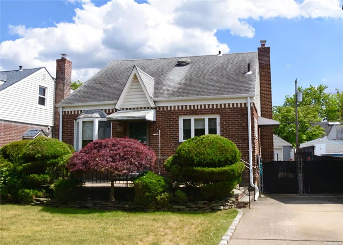 This Lovely Dormered Brick Cape Style Home Is Well Located On A Quiet Tree-Lined Street. It Offers A Living Room, Formal Dining Room, Eat-in-kitchen, 4 Bedrooms, 2.5 Baths, A Finished Basement, A Front Porch, Rear Deck, And Garage,