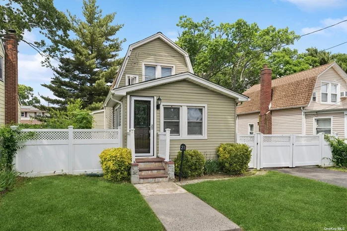 Beautifully renovated home ready for its next family. It features an open concept, hardwood floors throughout, updated kitchen with island, 3 bedrooms, updated bathroom, finished basement, central air, and large private yard with new pavers. Conveniently located near public transportation, schools, and more.