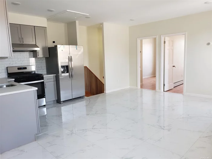 Newly renovated large bright and airy apartment on prime residential block at very convenient location. walk to J train 92 Street/Woodhaven Blvd. QM53, Q41 and Q56. Easy access to highways. Close to stores, shopping and schools and parks.