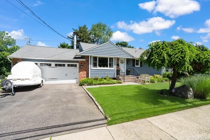 Expanded ranch with bluestone walkway and stoop, Oversized fenced in yard with trex deck. Hardwood flooring, Living room with fireplace. Large den with fireplace. Heated basement. Lots of upgrades including new windows & slider. 2 car garage. Approx. 2200 sq ft including garage.