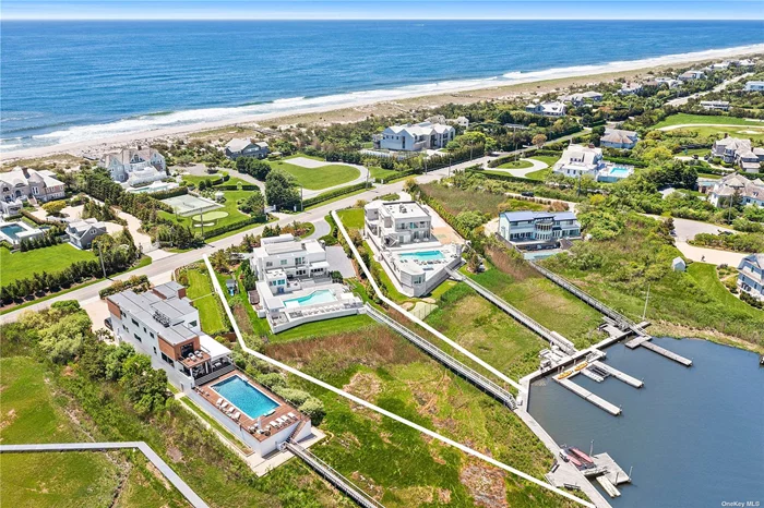Discover the epitome of luxury living in this completely turn-key bayfront home located in the desirable community of Quogue. This exquisite property boasts an array of high-end features and offers unparalleled access to both the bay and the ocean. The home features five spacious bedrooms, including a lavish primary suite, and five and a half luxurious bathrooms, each designed with elegant, modern finishes to provide ample space and convenience for residents and guests. The gourmet kitchen is equipped with top-of-the-line appliances, perfect for the home chef, while the open floor plan, high ceilings, and large windows create a bright and airy atmosphere that seamlessly blends indoor and outdoor living. Outside, the 20x40 gunite pool and hot tub serve as your private oasis, with a pool cabana featuring a wet bar and bathroom ideal for poolside entertaining and convenience. Boating enthusiasts will appreciate the bulkheaded property and floating dock, offering direct access to the bay. Additionally, a large rooftop deck offers expansive views of both the ocean and the bay, creating the perfect setting for relaxation and entertainment. Situated in a prime location, this property offers privacy and tranquility while being just minutes away from the vibrant amenities of both Villages of Quogue and Westhampton Beach. Fine dining and boutique shopping are all within reach, making this home an ideal retreat for those seeking the true Hamptons lifestyle. Designed for those who appreciate fine craftsmanship and exceptional attention to detail, this magnificent bayfront home in Quogue is not to be missed. Schedule your private showing today and experience the best of Hamptons living.