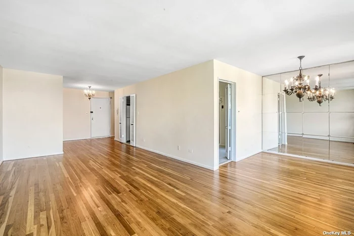 Beautiful 2 bedroom/2 bathroom unit with split layout. L shaped living room/dining room and EIK. 22 Ft. long terrace. 1200 sq. ft. Maintenance includes everything, Laundry room on lower level. Inground pool. Convenient for shopping and restaurants. NYC Express bus across the street. Close to major highways.