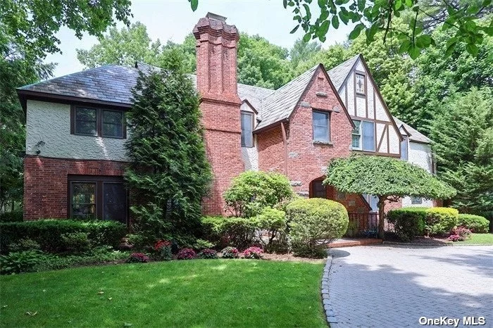 This magnificent Tudor-style residence is located in the prime location of Great Neck Estates, facing south with abundant sunshine. The 5-bedroom, 5-bathroom home boasts elegant design with high-end materials used throughout, including a designer kitchen that is perfect for cooking and entertaining guests. The unique 50&rsquo;6x27&rsquo;0 indoor swimming pool in the sunny room allows for year-round swimming enjoyment. The spacious master bedroom with a fireplace, high ceilings, and exquisite decorative lines adds a luxurious feel to the home, making it the ideal place to relax after a long day. The basement and backyard have been renovated to add charm to this beautiful property. The property is located in an optional school district, providing flexibility for families. Residents can enjoy the convenience of rural facilities, including private police, seaside parks, swimming pools, winter and summer tennis courts. It is close to town, shopping, and the LIRR. With a 25-minute ride on the express train, you can reach Manhattan, making this home truly have it all. You can enjoy the tranquility of suburban life while still having easy access to the bustling commercial and entertainment areas of the city. If you are looking for a luxury home in a prime location, this stunning Tudor is the best choice. must to see!!!
