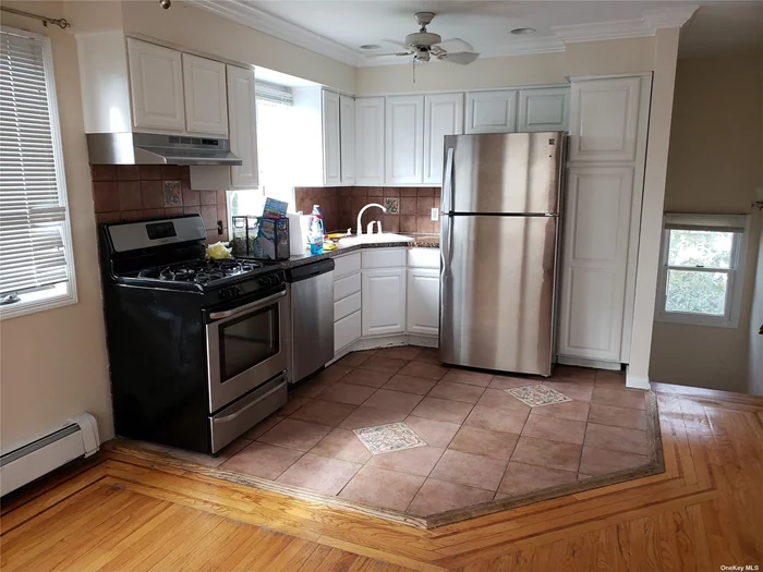 This spacious 2 Bedroom Apartment is situated in the upstairs of a lovely West Babylon home. The large and airy living room is warm and inviting. The adjourning Kitchen features gas cooking and a dishwasher. Close to all, this conveniently located apartment included all utilities.
