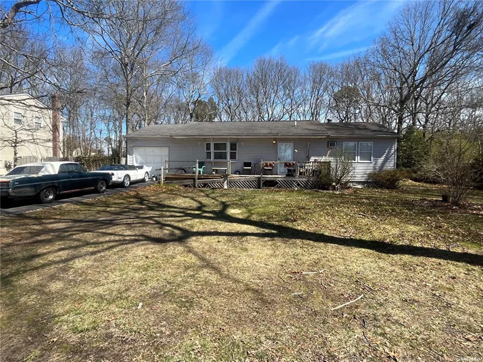 Large yard, lots of living space, den with fireplace and sliding doors to back yard. Vaulted Ceilings, skylight, bright living space. Large driveway with attached garage. Make it home!