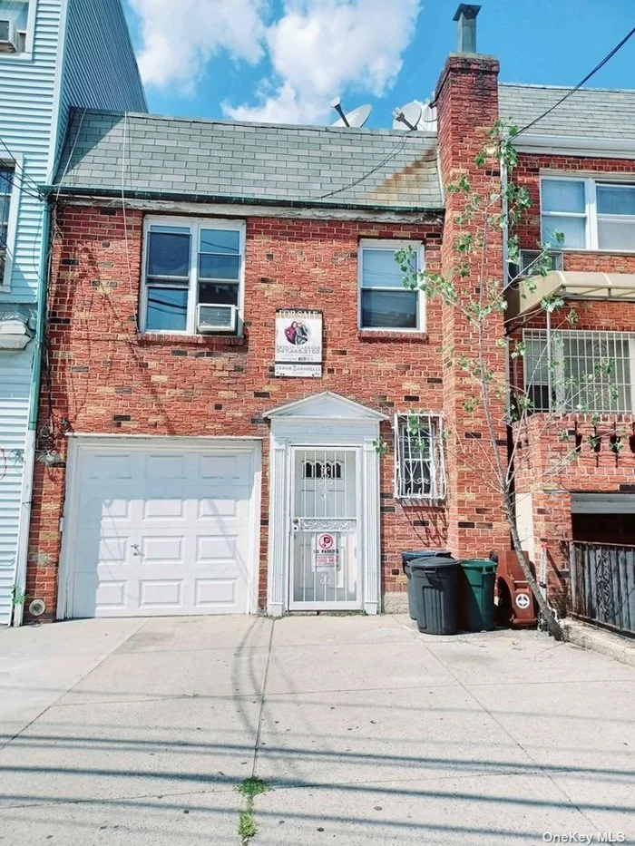 2 Dwelling Brick House Two Blocks From 7 Train, Roosevelt Ave, Shopping, Business And All. Private Driveway, Covered Garage, New Boiler And Hot Water Tank, Roof Just 8 Years Old, Renovated Kitchen With Stainless Steel Appliances, New Bathrooms With Skylight, Rear Balcony And More.
