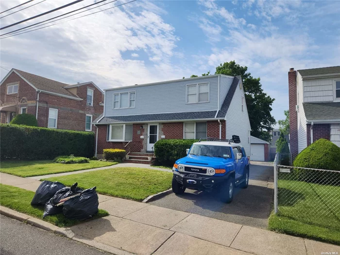 Move right into this nicely updated 1st floor unit in a legal 2 family home. Living Romm, FDR, EIK, Master BR, Full Bath, BR, BR. Use of the front and rear yard, Patio