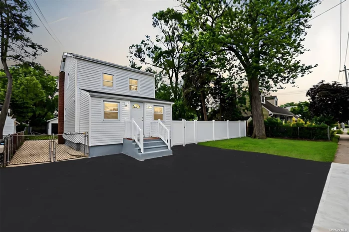 Welcome to this fully updated classic Colonial in a serene Bellmore neighborhood.The open-concept design connects the living and dining rooms, creating an inviting atmosphere filled with natural light from large windows.The Modern kitchen features granite countertops, stainless steel appliances, ample cabinet space, and a center island for prep and casual dining. It flows seamlessly into a cozy family room, perfect for gatherings or quiet evenings..This home boasts 4 spacious bedrooms and two modern bathrooms.Brand New Sidings & Roofing.The full unfinished basement with Bilco doors provides customization potential.Additional features include a private driveway, ample parking, and a detached two-car garage. Combining modern elegance with practical functionality, this home provides a comfortable and stylish living space for everyone.Welcome home!