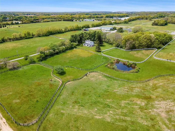 Introducing largest operating equestrian facility on the North Fork of Long Island. This unparalleled property was once the original Entenmann&rsquo;s Equestrian Facility, boasting 107 acres. The farm features a four-bedroom, two-bathroom Home. The property includes 90 horse stalls distributed across three boarding barns, a well-maintained half-mile race track , a dedicated maintenance barn, and a nightwatchman&rsquo;s quarters for round-the-clock care. Several well-appointed paddocks and ample land ensure your horses thrive in a serene and spacious environment.