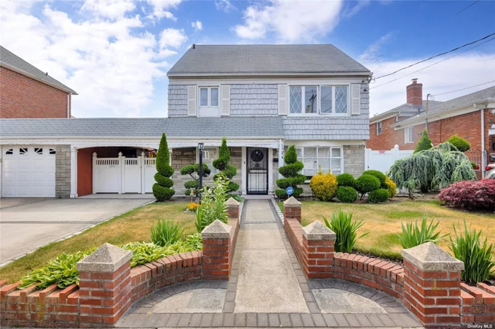 This spacious one-family home in Howard Beach, Queens, sits on a generous 70 by 100 lot. Featuring a split-level layout, it offers versatile living options. The first floor walk-in boasts a bedroom, a combined living room and kitchen, plus a full bath. Enjoy the luxury of radiant heat in the tiled floors and an integrated audio system. Upstairs, the second floor hosts another bedroom, a formal living room and dining area, and a modern kitchen equipped with granite counters, stainless steel appliances, and hi-hat lighting. Indulge in the convenience of surround sound and a two-oven stove with a water pipe. The second floor bath is a haven of luxury with a steam shower featuring dual rain heads and a hand-held option. The third floor has 2 large size bedrooms! Additional highlights include central air conditioning, Wi-Fi thermostats, keyless entry, and an alarm system for added security. Step out onto the deck from the dining room and enjoy the outdoors. The home also boasts a natural gas backup generator, ensuring peace of mind during power outages. Gas heating, two water heaters, and a washer-dryer add to the home&rsquo;s convenience. Parking is a breeze with a two-car garage and a sally port. Outside, the expansive yard beckons with an in-ground pool and a gazebo complete with a kitchen and bar. Perfect for both users and investors, this property offers endless possibilities on its vast lot.