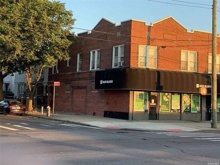 GREAT OPPORTUNITY CORNER PROPERTY BRICK 2 RESIDENTIAL UNITS 1 COMMERCIAL MIXED USE PROPERTY....BUSY TRAFFIC AREA.