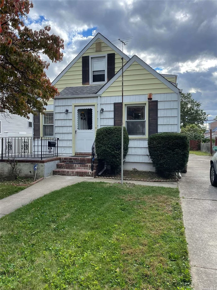 Four Bedroom Cape Located In Queens Section Of New Hyde Park. Eat In Kitchen And Good Size Living Room. Finished Basement. Close to ALL Public Transportation (bus and LIRR) And Major Highways And Shopping Plazas.