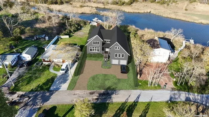 Build your very own Hamptons dream home with all of the bells and whistles on this south of the highway totally cleared .50-acre waterfront lot with over 100 feet of frontage. Plans and permits are in the works to build a spectacular 5000 sq/ft traditional Hamptons beach house with a pool, or you can build whatever style and size custom home that you desire. This prime location offers excellent proximity to world renowned golf courses, fine restaurants and beautiful ocean beaches. See attached all site plans, floor plans and renderings.