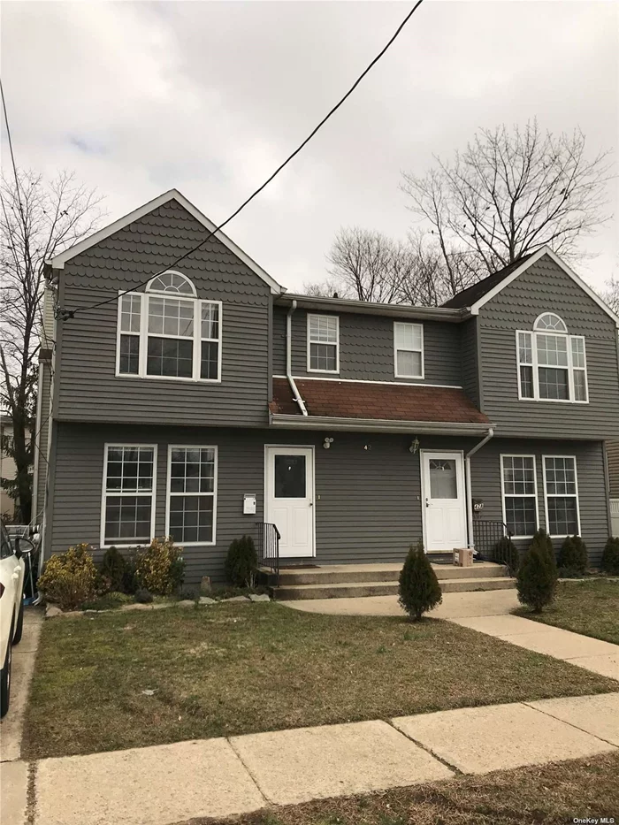 Move right in to this updated and modern 3 bedroom, 2.5 bath home. 1st floor has large eat-in kitchen, living/dining room combo with fireplace and powder room. 2nd floor has primary bedroom with full bathroom, 2 additional bedrooms with full bathroom. Full finished basement. Off street parking spot.