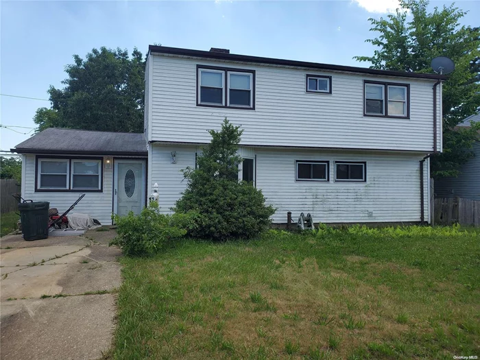 Expanded Levitt, Full front dormer and garage conversion. 4 BR/2 bath home on 60 x 100 property. needs TLC