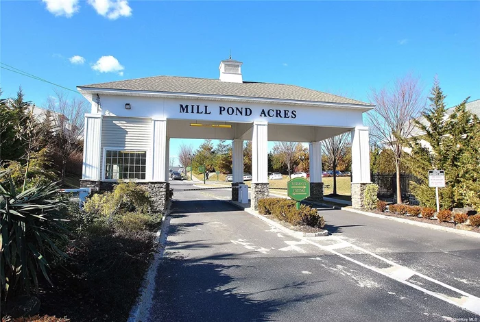 Fantastic year round unfurnished condo in gated community of Mill Pond Acres. Move right into this bright and lovely 2 bedroom 2 bath second floor apt. Vaulted ceiling w skylight welcomes you to a large living room/dining room, office nook, and kitchen area with gas cooking. There is plenty of closet space and an outdoor balcony. Washer and dryer are in this unit,  The assigned parking space is right in front of your entrance. You have the convenience of a Jitney service and use of the clubhouse with a game room, gym, indoor pool and outdoor patios, tennis courts and gazebos in a beautiful parklike setting. This 55+ community is close to all.