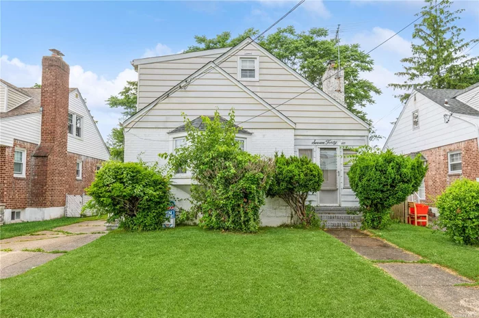4 Bedroom 3 Fbth Cape with 2nd floor dormer. Centrally Located, Gas Heat, Enclosed Front Porch, Hw floors, New Fridge, 6 year Roof, Full Fin basement, Motivated Seller. Near LIRR, Shops and Schools.