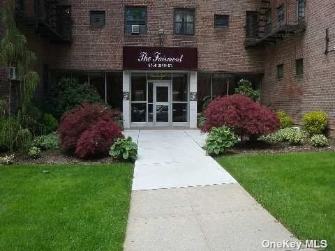 Great Co-op Clean elevator building. Lovely grounds. Large Co-op with walk in closet and two double closest in king size bedroom. another built in closet in dining room. needs a little work. near to busses, E & F train and Long Island Railroad, express busses to Manhattan.  Near to stores and restaurants. Maintenace includes gas, electric, water, taxes. There is a fee for A/C. and a waiting list for parking.