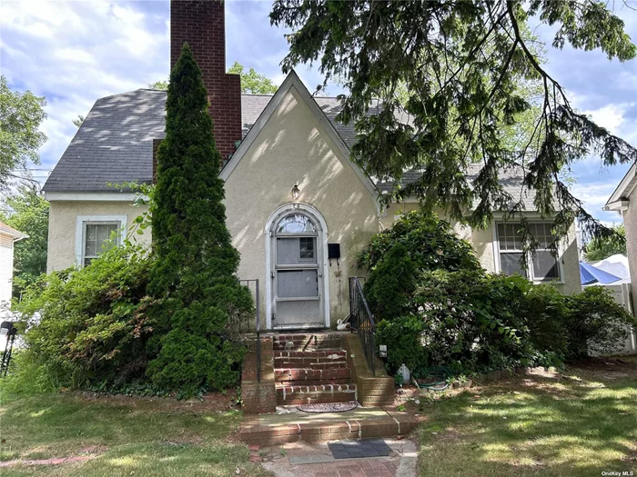 Original characteristics in this tutor style home located on a quiet residential street offfers 3/4 br, 2fbths, a full unfinished basement and detached double garage on 52 X 118 property.