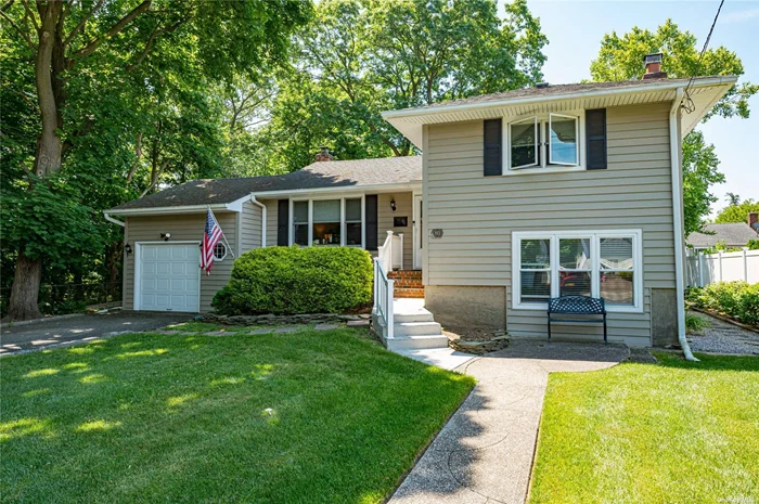 Meticulously maintained 3BR/1.5Bath (room to add shower) split that adjoins Massapequa preserve. Privacy, privacy, privacy at the head of the dead end.  Enjoy nature while relaxing on the paver patio. For small boaters, there are front and rear garage doors. Inside there are three ample bedrooms on the upper level along with the full bath. Main level is the updated kitchen, formal dining room and formal living room with hardwoods beneath the carpets. Down 5 steps to the oversized den with fireplace which was formerly a garage. 2 minutes to Southern State and minutes from all that Massapequa has to offer from restaurants and pubs to the beaches and parks. THIS is the one.