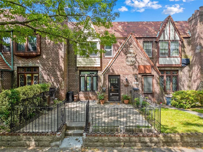 Rare beautifully restored English tudor-style Brick Row house! This 20ft wide Modern thoughtful designed house situated on one of the most central treeline block in the area.Incredible comprehensiveness features on this diamond move-in ready resident! First level offer spacious living room , dinning room , full bathroom , new SS kitchen and behind the patio glass door there is a newly tiled terrace!Second floor offers a primary bedroom that has a private bathroom and a walk-in closet , two other bedroom and a open living room/ office room space !It has a skylight windows which is truly amazing !On the lower level which is a walk-in on-ground basement has separate entrance. It offers a boiler room with new NAVIEN HW/Heat system(GAS), three heating zoning , bathroom and Complete finished open space await yours to use ! Attached garage and private driveway/backyard could park up to 4 cars ! Huge paverlized front yard gives you additional usable outdoor space . Best school district 26 ! Convenient location nearby everything!1 block to the park , 2 block to Q27/Q26 bus to Flushing! New Split ac unit on 1st level and many more to offers !