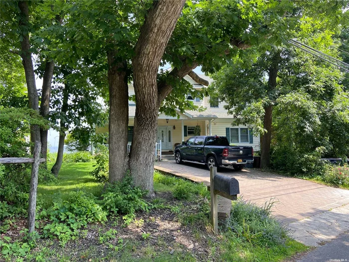 HUGE PRICE BREAK!PRICED TO SELL!!! Opportunity of lifetime..Imagine, Million Dollar Waterview&rsquo;s For The Rest Of Your Life ? Don&rsquo;t miss you chance to be a part of this stunning, private beach community, whether you&rsquo;re looking for a year-round home or vacation property. Sitting on a half acre with breathtaking views of the Long Island Sound, this 2800+ square foot home has endless potential. With a little TLC and Vision, Re-create this spacious waterfront home of your dreams with gorgeous wrap-around decking and views This home also holds large-scale fully finished first Floor-Suite For Guests and Extended Family,  basement w/ OSE Beach access is only steps away and incredibly private (only 49 houses in the community), where you can use jet-skis, fish, kayak and more. No flood insurance needed, and modest annual HOA fee at $650 per year. Shockingly low taxes at $17K per year without STAR! Entire Second Floor, 4 Zone Heating, Siding, Windows, Electric. Upstairs Balcony and CAC All New in 2018.....