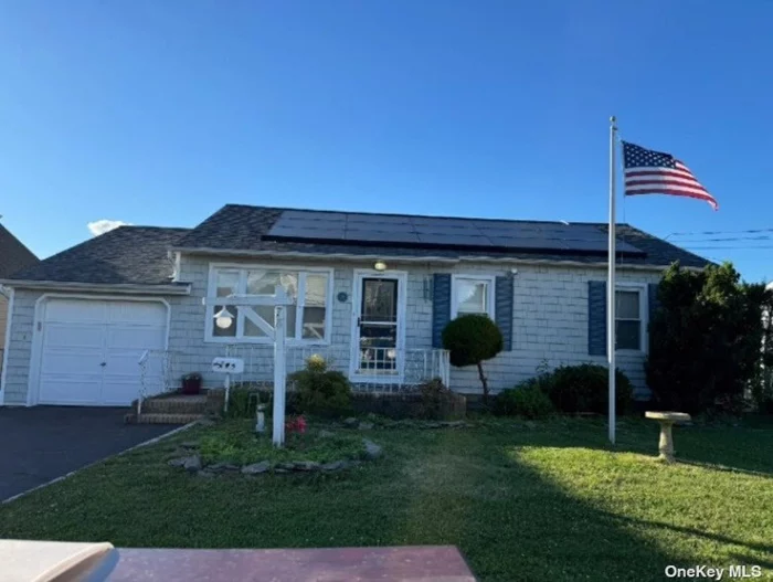 Lovely 3 bedroom Wide Line Cape on a 60x100 level lot. This property has some water views and is facing the sound. Private driveway with enclosed one car garage. Private fenced in rear yard. Put your personal stamp on this affordable water community home. Property has solar panels.