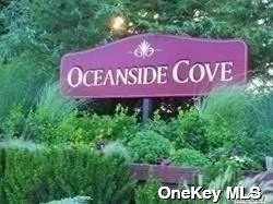 Oceanside Cove Ground Floor Corner Unit, Living Room/Dining Room with Sliding Glass Doors to Private Patio, Efficiency Kitchen with Pass through, New 1/2 Bath, Large Bedroom with New Full Bath, Plenty of Closet Space, Assigned Parking Spot, Guest Parking, 24/7 Security, Gated Community, 3 In-Ground Pool, Sauna, Gym, Library, Playground, Tennis/Pickleball Court, Clubhouse and More!
