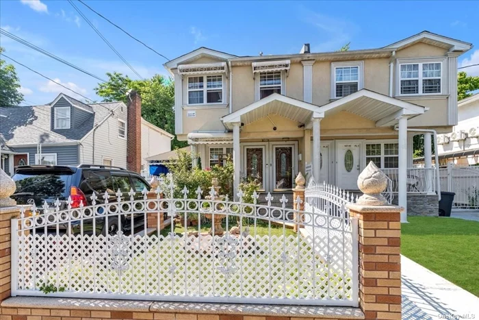 Legal 2 Family Semi-Attached. 2/2 Bedrooms. Full Finished Basement with Outside separate Entrance. Hardwood Floors. Recessed Lights. Private Driveway. Spiral Staircase from 2nd Floor to the Backyard.