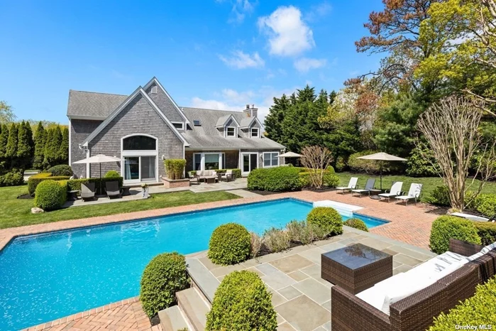 Summer fun in this Quogue Village postmodern home with an in-ground heated pool. This amazing fine quality home offers furnished comfort for you to relax and enjoy. Open the door and feel the flowing floor plan. There are vaulted cathedral ceilings, large entertaining living room, chef&rsquo;s kitchen with high end appliances, first floor bedroom suite; full bath with jacuzzi tub, shower and double vanity. Upstairs offers a second bedroom suite with soak tub, two additional ensuite bedrooms with shared bathroom and guest bedroom. Enjoy sitting on the front covered porch or lounge on the blue stone poolside patio. Lushly landscaped to perfection property. You can go beaching at the Village of Quogue Ocean beach too! Availability: July $45, 000, August-Labor Day $55, 000.