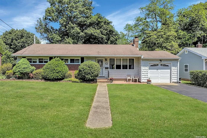 Welcome To This Cute Three Bedroom Ranch In The Heart Of Huntington Station. Large Brick Fireplace Located In Living Room Adjacent To Dining Area & Eat In Kitchen. Hardwood Floors. Full Basement Partially Finished. Very Nice Manageable Manicured Landscaped Fenced In Yard. Attached One Car Garage. Taxes Are $10, 358. Newer Oil Tank Above Ground In Basement. South Huntington School District. Home Is Located In Close Proximity To Shopping, Highways, Public Transportation And Entertainment. SOLD AS-IS.