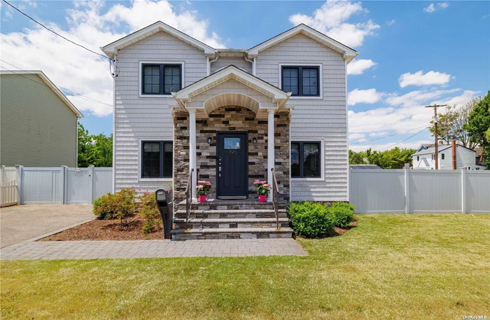 NO FLOOD INSURANCE NEEDED! This beautiful home was completely renovated in 2016 and features hardwood floors throughout, a gourmet kitchen with stainless steel appliances, granite countertops, and a convenient pantry for extra storage. The 1st floor also offers a versatile home office or den or potentially a 5th bedroom. The main living areas flow effortlessly, with ample natural light streaming through large windows that were imported from Germany.  The 2nd floor offers 4 generously sized bedrooms with ample closet space. The primary bedroom features an ensuite bath for added convenience. A laundry area on 2nd floor ensures efficiency in daily routines. Full basement, complete with a walkout to the backyard, presents endless possibilities for customization and expansion.  Close to LIRR, shopping, dining, parkways, Marina&rsquo;s and parks/beaches.  House qualifies for a downpayment assistance grant. Property taxes don&rsquo;t reflect STAR exemption.