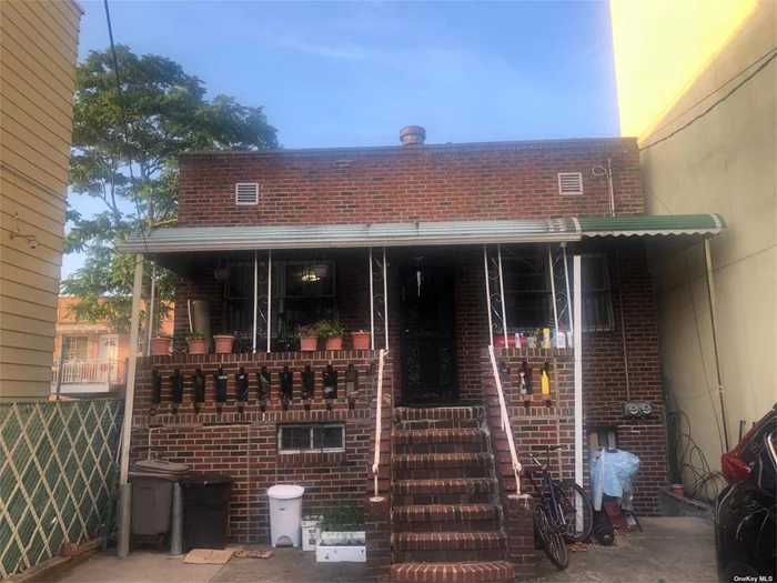 Legal 2 Family in the Heart of Elmhurst Conveniently located near local buses & subway, parks, schools, Queens Center Mall & more! Great income Property. 1st Family Living Room with Open Kitchen, 2 Bedrooms, Full Bath. 2nd Family is 2 bedrooms full bath