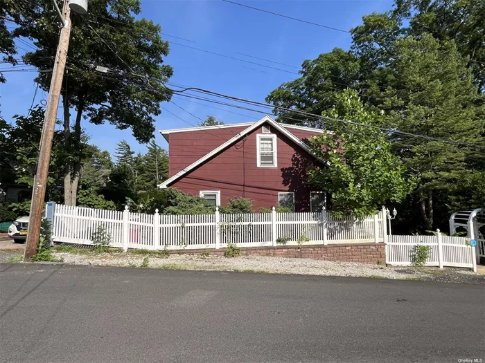 Charming two-story house in a quiet neighborhood in the Rocky Point Hills. The house sits on a large 10, 000 square foot lot with a well-manicured yard and a built-in pool. The side yard has a childen&rsquo;s playground, visible from the side deck off the living room. The unfinished basement has a washer & dryer. Attached shed for storage of yard and pool equipment. Central Vac system, sprinkler system, and in-wall AC unit in the living room.