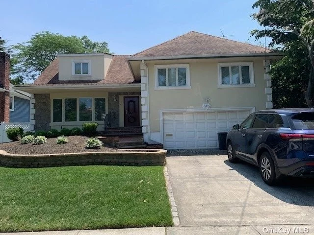 This one-of-a-kind split ranch home has been fully renovated, featuring radiant heat and a gorgeous eat-in kitchen with walkout backyard access. The split ranch design offers comfortable living with minimal stairs between floors, ensuring privacy and convenience for everyone. The house boasts 5 spacious bedrooms, 2.5 bathrooms, and a large finished walkout basement that opens to a meticulously manicured backyard and pool, perfect for family enjoyment. Conveniently located close to a park, top-rated schools, and shops. A virtual tour will be uploaded shortly. This property is a must-see to fully appreciate its unique charm and features.