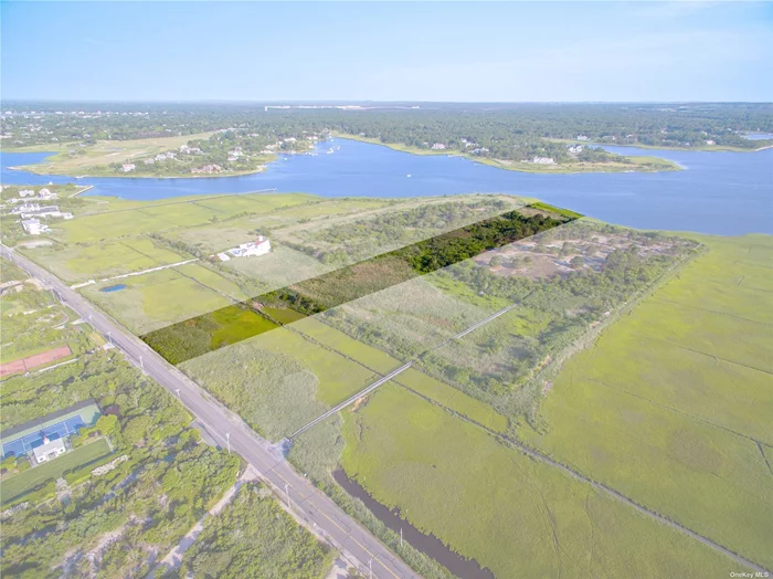 Bayfront Property on Dune Road, Quogue: This waterfront property is surrounded by preserved land and offers endless, unobstructed views and 114 feet of frontage on Shinnecock Bay. Call for more details.