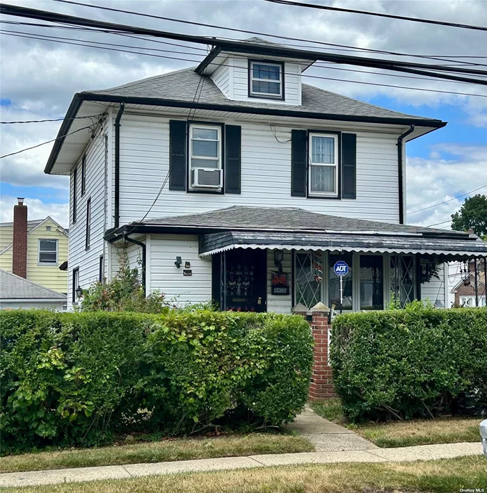 Charming Corner Home on a 60x100 Lot With Well Manicured Grounds. 2 Car Detached Garage, Driveway with Parking for 4 Cars. Interior Needs a Little TLC, but Has Great Potential. Full Finished Basement with OSE, 1.5 Baths, Formal Dining Room with Hardwood Floors Through Out.