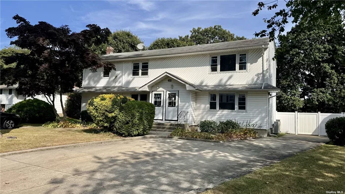 Totally renovated in Harborfields school district. This lovely home is nestled on a quiet neighborhood surrounding. It&rsquo;s a legal 2 family home. The first floor family consists 4 bedrooms and 3 bathrooms. It features a living room, formal dining room and new kitchen with SS appliances. Hardwood floors throughout the whole house. Full finished basement has plenty room for home office, gym and play area. Also has a full bathroom, laundry and an outside entrance. New deck added for relaxation and enjoyment of this fully fenced backyard. Move in ready!