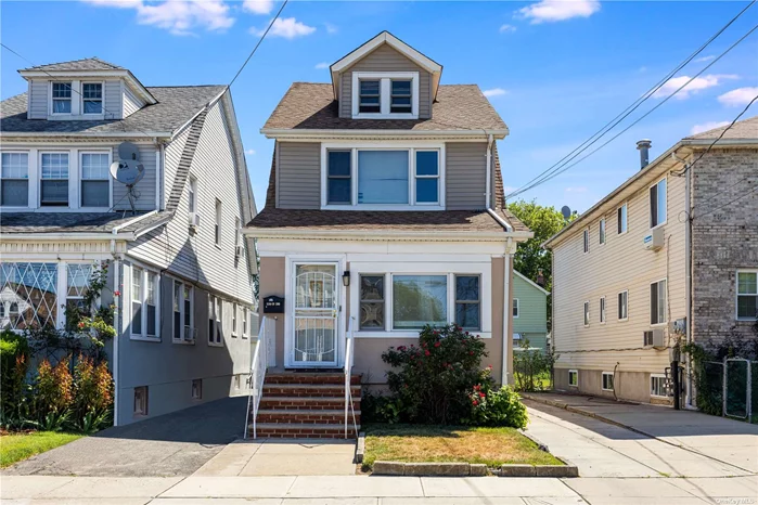 Updated three bedroom stucco home featuring two bathrooms, laminate flooring, eat-in kitchen, granite counter tops, stainless steel appliances. Full basement with side entrance, walk -up attic with 6ft ceilings. Private driveway one car garage and backyard to the rear of the home.