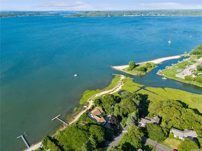 Welcome To 1745 N Parish Dr - A Coastal Gem On One Of Southold&rsquo;s Most Desirable Streets! With Its BayFront Location, You&rsquo;ll Enjoy Panoramic Water Views Of Peconic Bay, Shelter Island And Beyond! Just Steps Away Is Goose Creek Beach And Southold Yacht Club Adding To A Vibrant Fun Community Atmosphere. This Wonderful Family Home Filled With Natural Light Boasts 4 Bedrooms and Is The Perfect Blend Of Comfort And Luxury. A Generously Sized Waterfront Deck Provides An Ideal Setting For Sunrise Viewing, Alfresco Dining, Or Simply Soaking Up The Sun. Plus, With Your Own Private Beach, Every Day Feels Like A Vacation. This Home Is More Than Just A Place To Live - It&rsquo;s A Lifestyle. Whether You&rsquo;re A Water Sports Enthusiast Or Someone Who Appreciates The Tranquility Of A Waterside Retreat With Amazing Views, This Property Has Something For Everyone. So, Are You Ready To Take The Plunge?