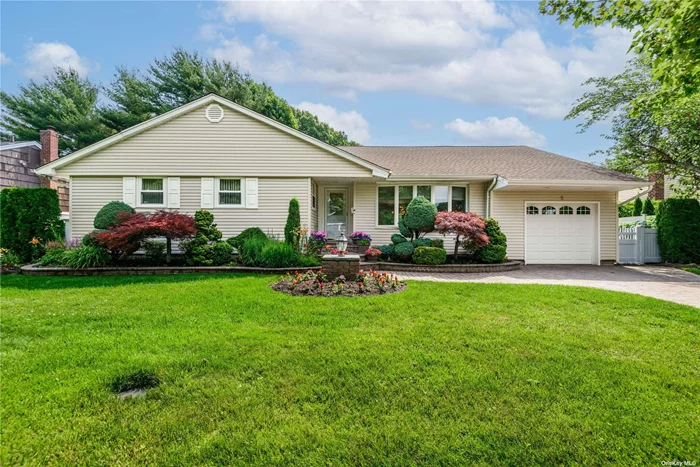 Welcome to This Stunning Ranch in the Heart of Syosset. This Spacious Home Boasts 3 Bdrms, 3 Bathrooms. Immerse Yourself in the Bright, Open Living Space, Featuring a Seamlessly Connected Living Room, Dining Room, and Den - Ideal for Entertaining. The Beautifully Designed Eat-In Kitchen was Built with Function in Mind and Includes a GAS stove, Wine Fridge, and Stainless-Steel Appliances.  The First-Floor Primary Suite Boasts a Spacious Walk-In Closet and Ensuite Bathroom. Two Additional Bdrms and a Bathroom Complete the Main Level. The Expansive Finished Basement Offers Endless Possibilities - A Guest Retreat, a Dedicated Play Area, a Home Office, or even a Potential Mother-Daughter Setup, with Proper Permits. Gleaming Hardwood Floors and an Abundance of Natural Light Flow Throughout. Designed with Entertainment in Mind, the Beautifully Landscaped Property Is Perfect for Relaxation. Additional Luxuries Include a Cozy Fireplace for Chilly Nights; 2-Zone Heating; Central Air Conditioning for Year-Round Comfort, Central Alarm System, 4 Zone Automatic Sprinklers, Laundry Chute and Bluetooth speakers in Bathrooms! A Rare Gem, This Home Offers Both Convenience and Serenity. Will Not Last!