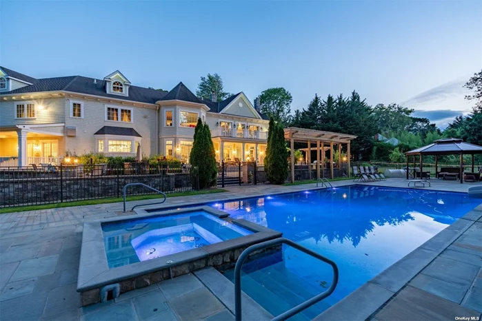 The epitome of luxury! Rare opportunity to acquire builders own 2012 cedar shake Colonial in Cold Spring Harbor situated at the end of a cul-de-sac on treelined street. Greeted by circular driveway, enter double doors to grandiose two-story foyer leading to -6100sqft of living space appointed with detailed mouldings. Top-of-the-line materials used throughout, Marvin windows, radiant floor heat on all tiled surfaces, geothermal HVAC providing efficiency and low utility costs. 44&rsquo;x20&rsquo; professional eat-in kitchen with granite countertops, marble backsplash, Wolf gas range with griddle and grill, 2 dishwashers, bar with beverage drawers and seating for 6, breakfast area, wet bar with wine fridge and French doors to mahogany covered porch. Adjoining 36&rsquo;x22&rsquo; family room with wood burning fireplace creates one -850sqft space, perfect for entertaining and everyday living. Laundry room, dining room, living room, water closet, and en-suite bedroom complete the first level. Second level encompasses 5 bedrooms including 1 en-suite bedroom, 2 bedrooms with adjoining bath, and primary en-suite wing with gas fireplace, 2 walk-in closets, private mahogany deck overlooking backyard, and luxurious marble bath with jetted tub/steam shower. Plus home office and 29&rsquo;x25&rsquo; bonus room that can be used for recreation/gym. Well-thought out with quality and craftsmanship in mind, includes built-in speakers inside and out, camera security system, -3000sqft basement with 10ft ceilings, -1000sqft walk-up attic, 3 car garage with radiant heat floor and AC. Situated on 2.07 acres this staycation-like property features specimen plantings, irrigation system, landscape lighting, sprawling lawn, flower gardens, and saltwater heated gunite pool/spa surrounded by expansive bluestone patio. Only 1.5 miles to train station with direct line to Penn and Grand Central Station. Nearby schools, library, hiking trails, quaint village of Cold Spring Harbor and Eagle Dock Beach (fee) with mooring rights and kayak storage. Total Taxes: $55, 602/yr